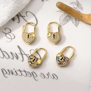 Golden heart lock earrings with zircon inlay and hollow keyhole detail for women