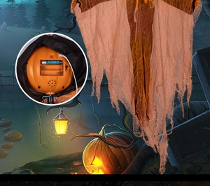 Detail of the internal battery compartment and power unit for the hanging pumpkin decor