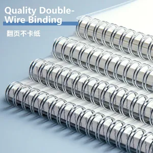 Minimalist B5 spiral notebook with durable silver double coil and grid paper layout