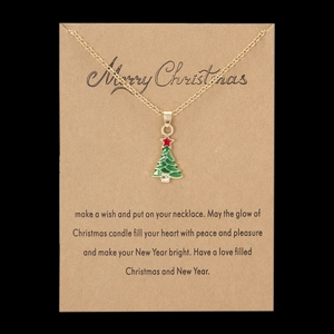 Weihnachtsbaum-Halskette auf Kraftpapier-Geschenkkarte mit Merry Christmas Grußbotschaft