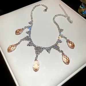 Elegant silver-toned necklace with zircon drops and champagne water-drop tassels for women