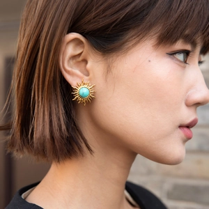 Bohemian 18K gold plated sun stud earrings with turquoise center stone on model