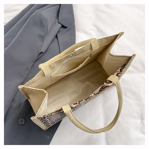 Interior view of leopard print linen tote featuring a zipper pocket and woven handles