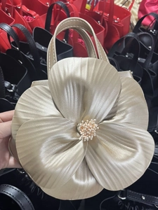 Champagne gold floral petal tote bag with metallic finish and sculptural 3D design