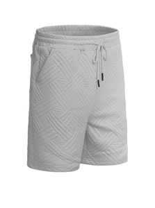 Détail du short en maille gris clair pour homme avec texture jacquard géométrique et cordon serrage