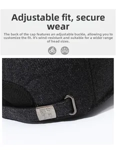Close-up of adjustable metal buckle on wool blend baseball cap with engraved detail