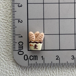 Detailed scale view of a miniature resin bread accessory measuring approx 1cm