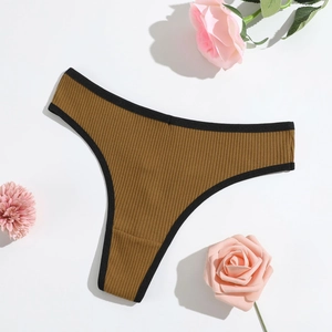 Detail of brown ribbed cotton thong with black trim and soft breathable texture