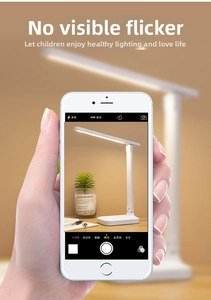 Detailed view of white LED desk lamp showing flicker-free eye protection technology