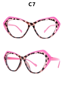 Close-up of cat-eye glasses frame featuring pink leopard print texture and contrast design
