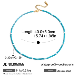 Detailed spec view of turquoise and white bead stainless steel necklace with measurements