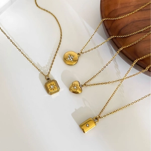 Minimalist gold stainless steel necklaces featuring heart, square, and round pendants