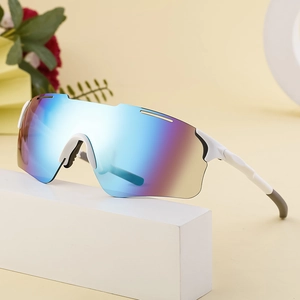 Outdoor cycling sunglasses with white frame and blue-purple gradient lenses on a white pedestal