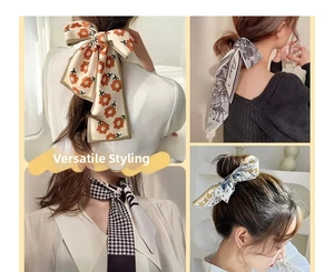 Detailed views of French style silk ribbons with floral and houndstooth patterns