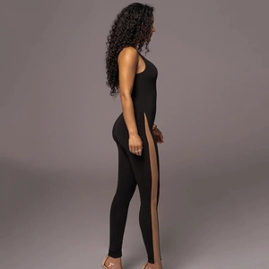 Slimming sleeveless black jumpsuit with sheer side panels and backless design