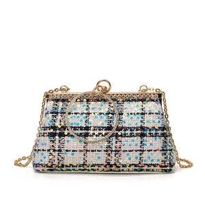 Elegant sequined tweed evening clutch bag with gold ring handle and chain shoulder strap