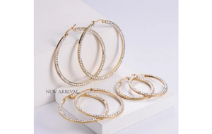 Detailed set of three sizes of gold-plated hoop earrings with micro-set rhinestones