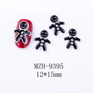 Detail von 12x15mm schwarzen Lebkuchenmann Nagelcharms mit Strasssteinen und roten Proben