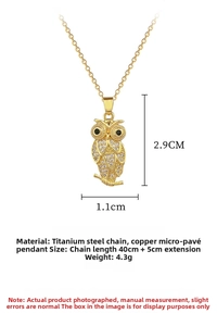 Macro detail of gold owl pendant with sparkling micro-pave stones and titanium steel chain