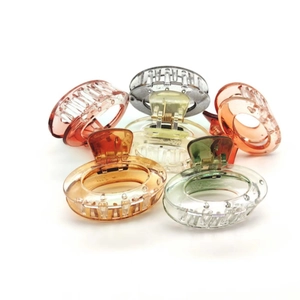 Set of six colorful gradient acetate small claw clips for children in diverse pastel shades