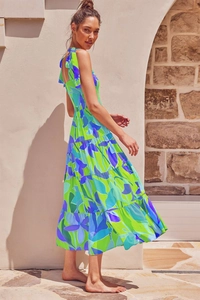 Detail of smocked bodice and adjustable tie straps on a floral summer maxi dress