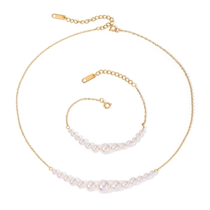 18k gold stainless steel jewelry set with gradient pearls featuring necklace and bracelet