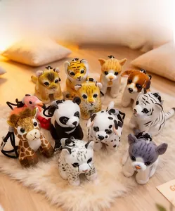 Plush animal keychains collection featuring panda, tiger, and giraffe on a soft carpet