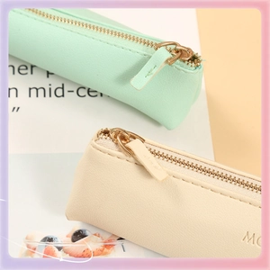 Mini PU leather pencil cases in pastel green and cream with high quality metal zippers