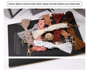 Detailed macro view of handmade macrame keychains with cotton tassels and gold metal clips