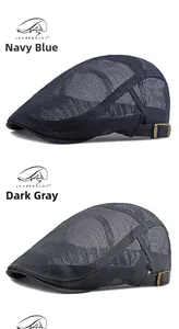 Detailed view of navy blue and dark grey mesh beret hats with adjustable metal buckles