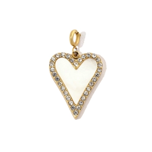 Detailed view of heart-shaped shell pendant with gold plating and sparkling crystals