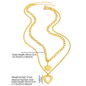 Detail of stainless steel double-layer necklace with wing and heart pendants