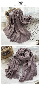 Detail of taro purple scarf showing solid color crinkle texture and fringe edges