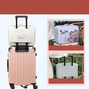 Cartoon travel organizer bag with bear print and luggage handle sleeve attachment