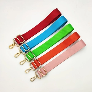 Adjustable nylon shoulder straps in multiple colors with gold-tone metal buckles