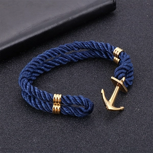 Men's navy blue braided nylon rope bracelet with golden stainless steel anchor clasp