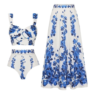 Three-piece floral bikini set with high-waisted long skirt and blue porcelain print