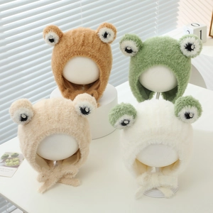 Plush frog hats for kids in green, beige, brown and white with earflaps and chin straps