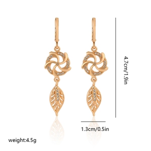 Champagne gold leaf drop earrings with white zircon accents, 4.7cm length on white base