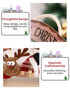 Detail of handmade reindeer ornament with red tartan fabric and rustic wooden sign