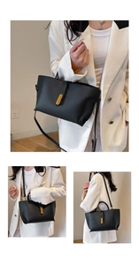 Detail of black pebbled leather tote featuring a gold metal lock and versatile straps
