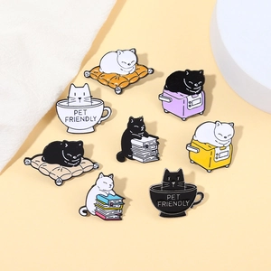 Set of 8 cute cartoon black and white cat enamel pins featuring coffee and books themes
