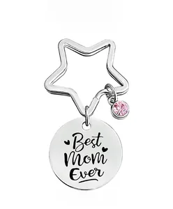Detail showing Best Mom Ever engraved on a stainless steel keychain with pink crystal charm