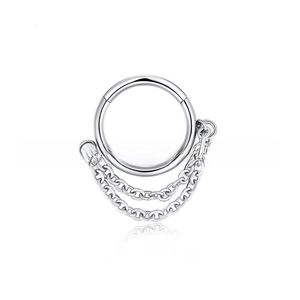 Detailed view of silver stainless steel hoop earrings with hanging triple layer chains