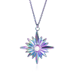 Detail of rainbow star pendant with cubic zirconia inlay on polished chain