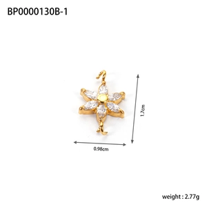 Detail view of gold flower pendant with zircons showing dimensions 1.7cm and weight 2.77g