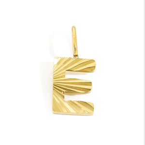 Detail showing gold stainless steel letter E pendant with radial sunburst texture