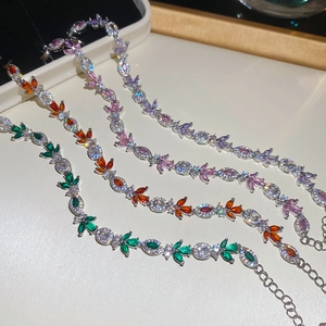 Macro detail of leaf-shaped marquise-cut zircon bracelets in four elegant colors