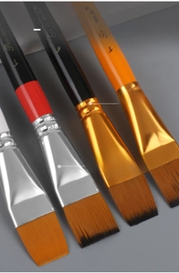 Detail of durable aluminum ferrules and nylon bristles on colorful wooden oil paint brushes