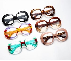 Collection of oversized retro round eyewear frames in diverse pop-art color patterns